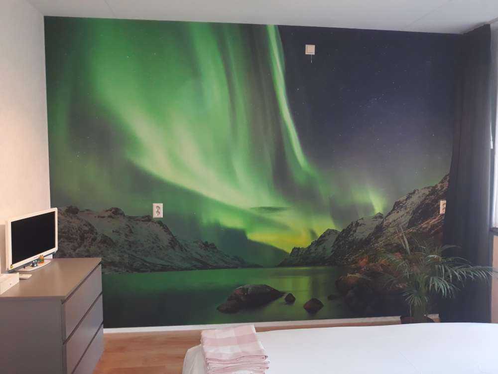 Noorderlicht tussen twee fjorden