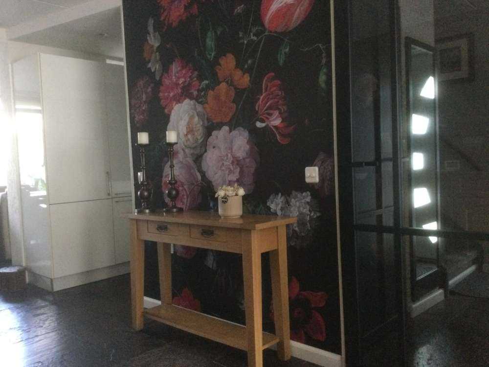 Stilleven met bloemen in een glazen vaas