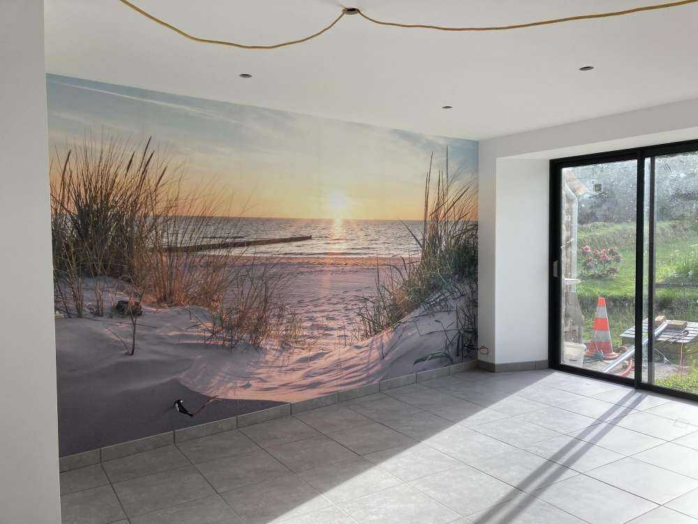 Duinstrand met zonsondergang