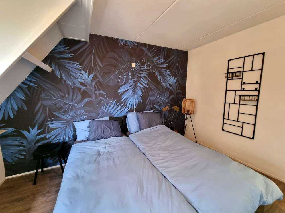 Blauwe tropische bladeren