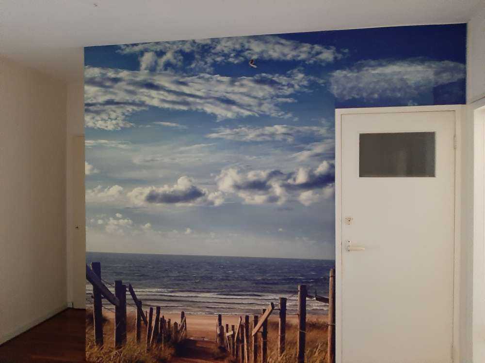 Strand en wolken