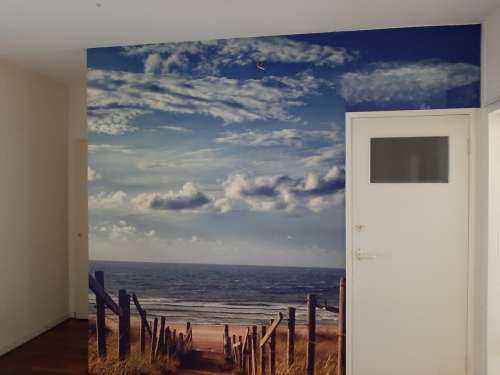 Strand en wolken