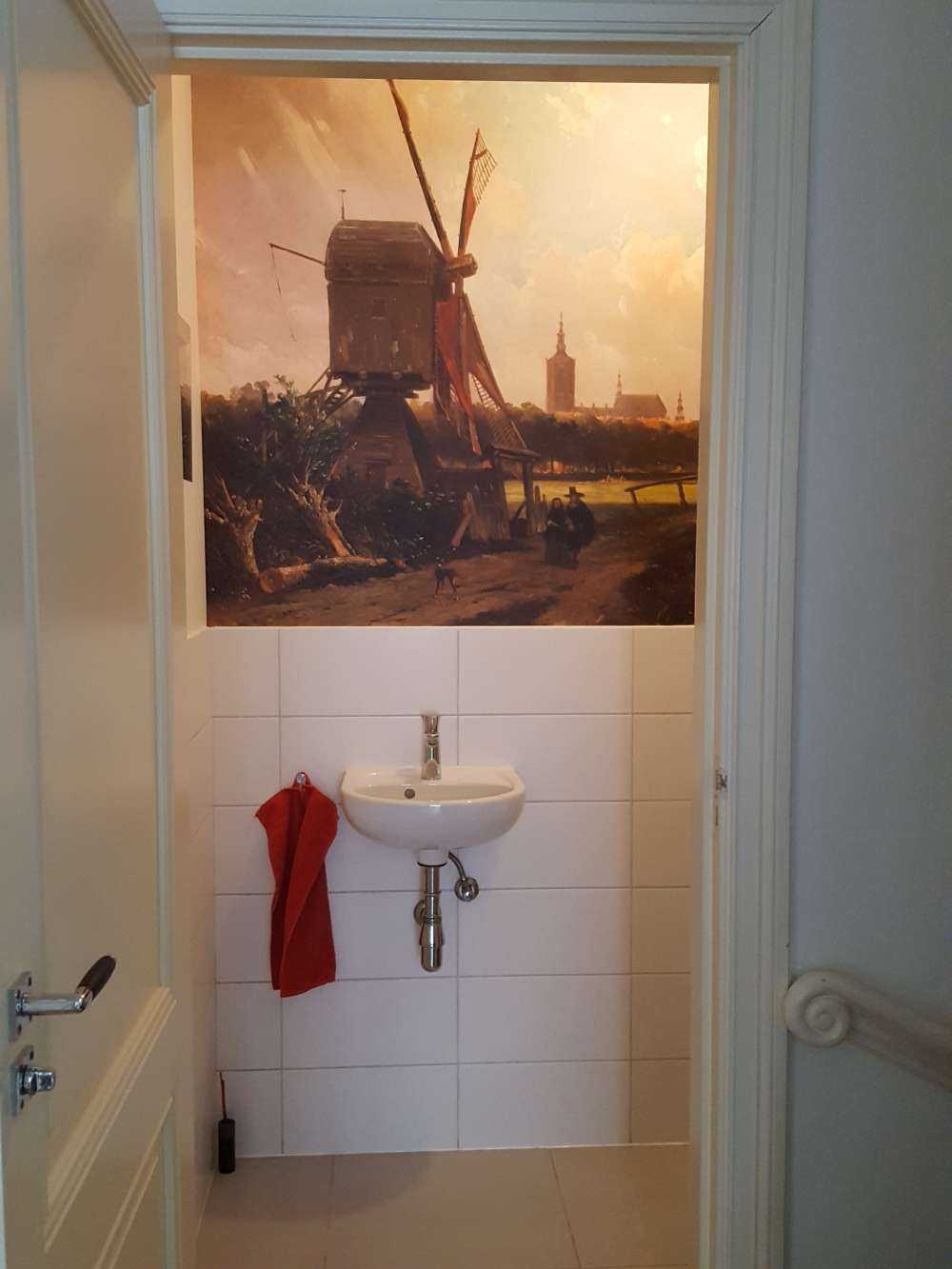Gezicht op Den Haag vanaf de Delftse vaart in de zeventiende eeuw