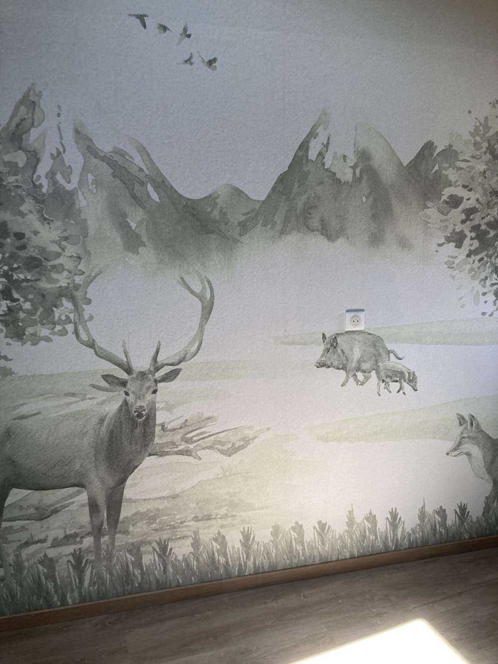 Bos met dieren in groen