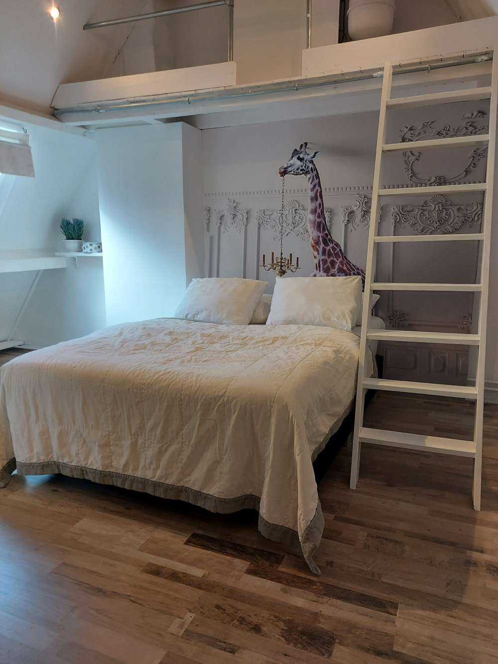 Giraffe met kandelaar