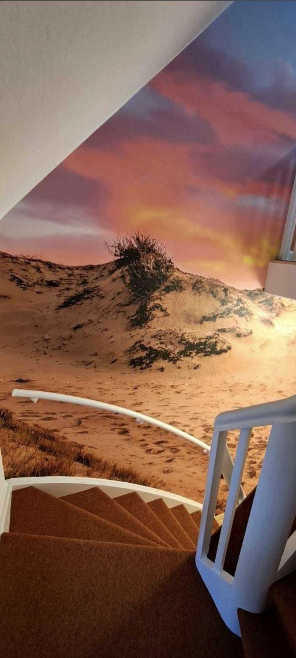 Zonsondergang vanuit de duinen