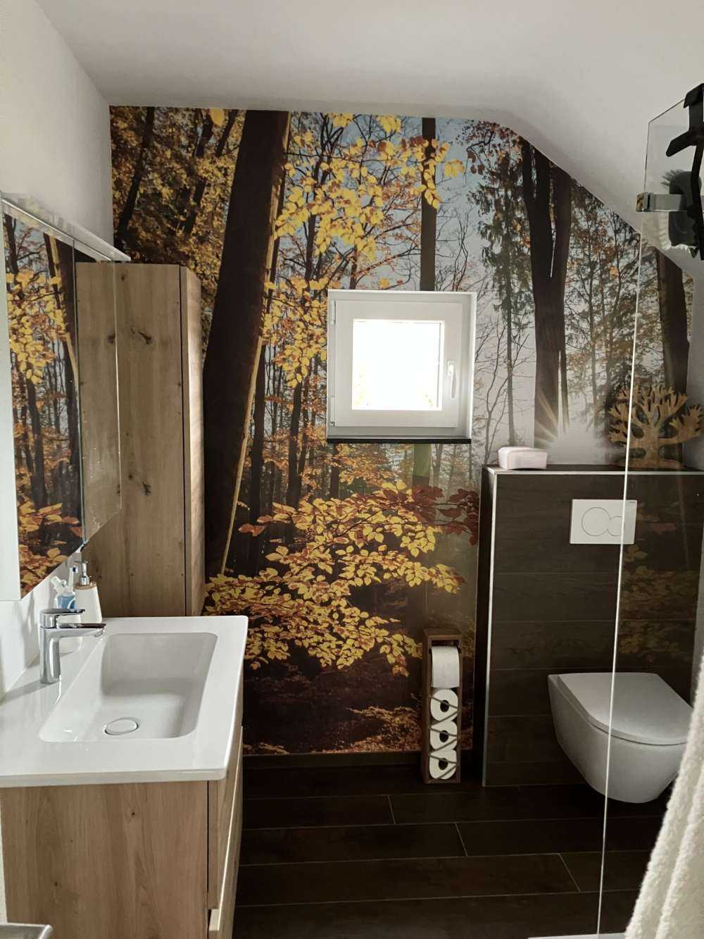 Herfstige bos