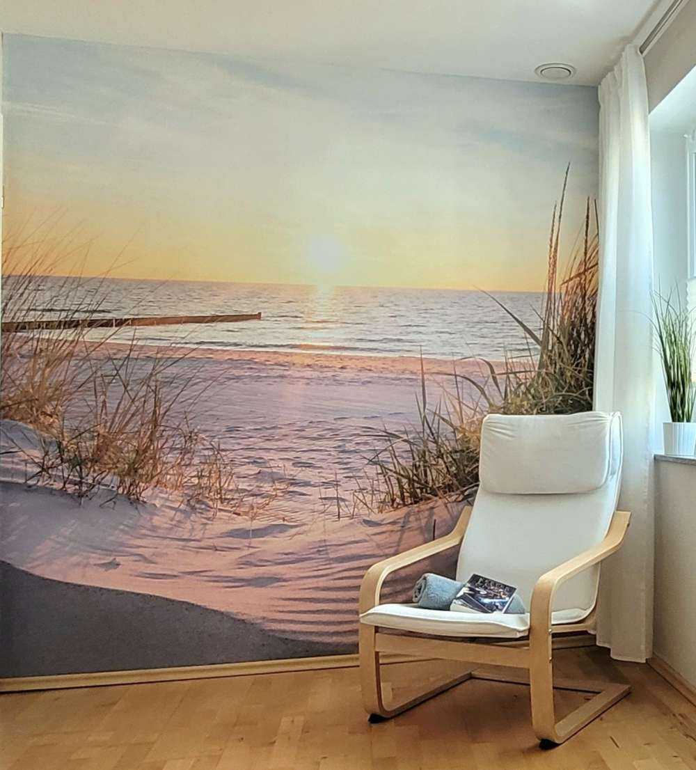 Duinstrand met zonsondergang