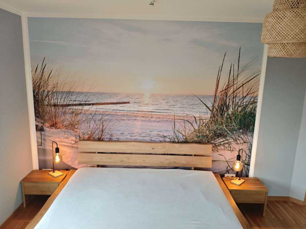 Duinstrand met zonsondergang