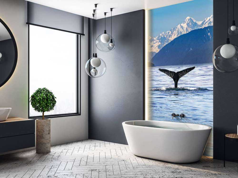 Duikende walvis met bergen op de achtergrond