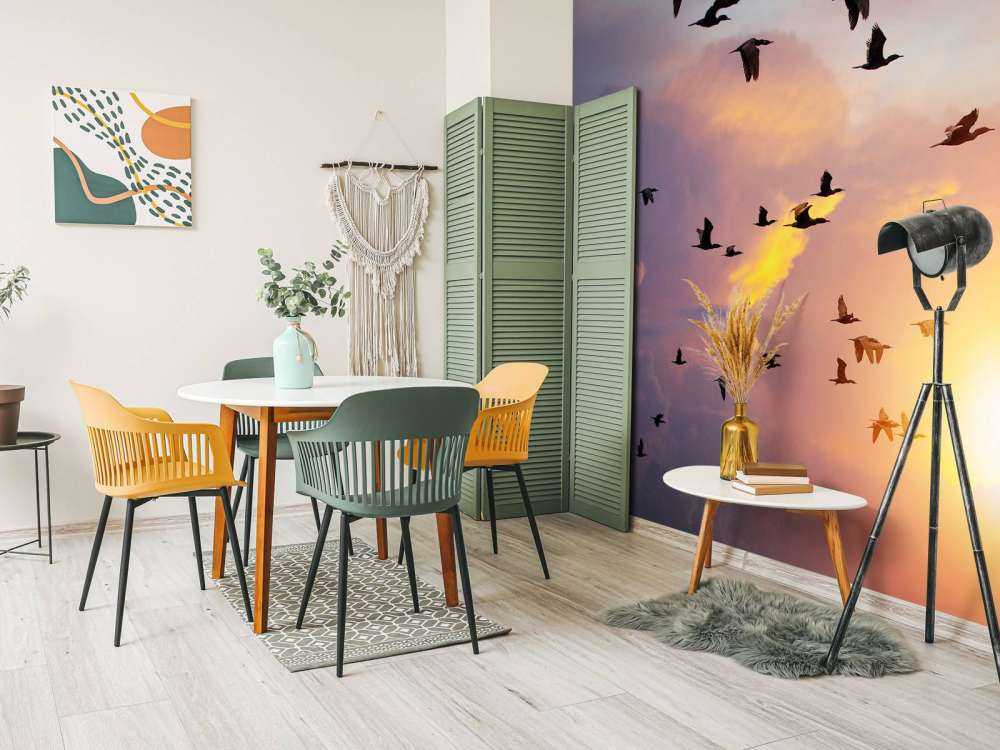 Vliegende aalscholvers bij zonsondergang