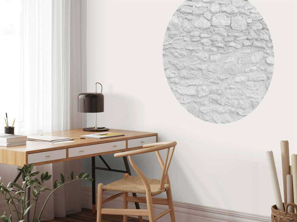 Lichte muur met grove stenen