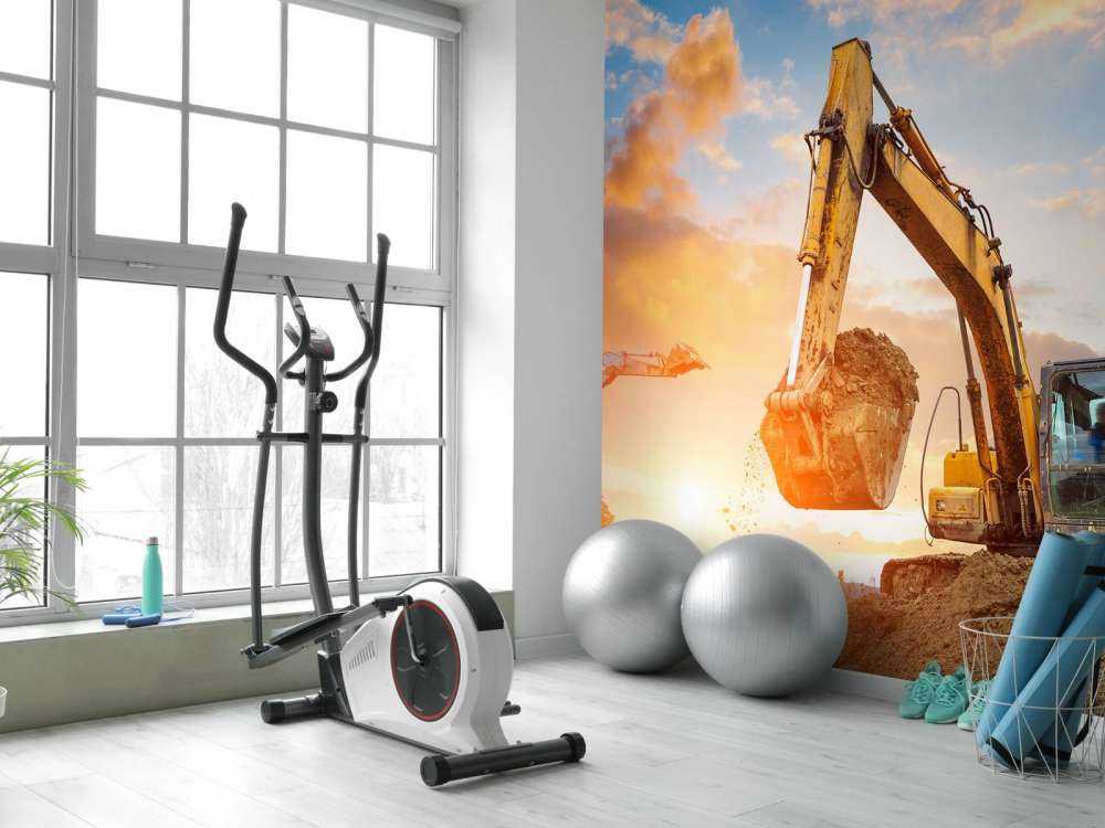 Graafmachines bij zonsondergang