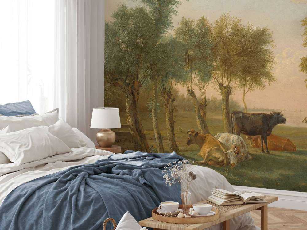 Koeien in de wei bij een boerderij