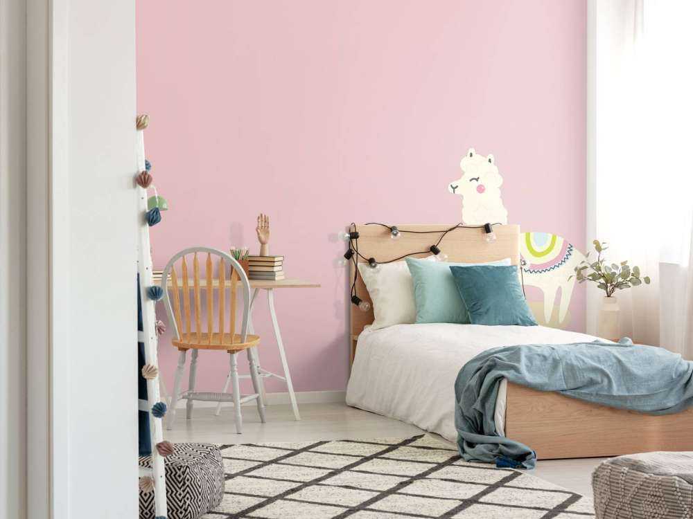 Alpaca design met een roze achtergrond