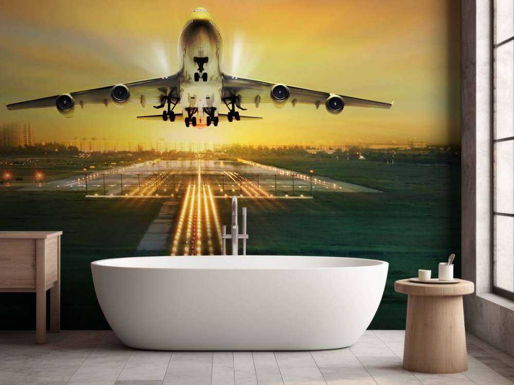 Passagiersvliegtuig stijgt op bij zonsondergang