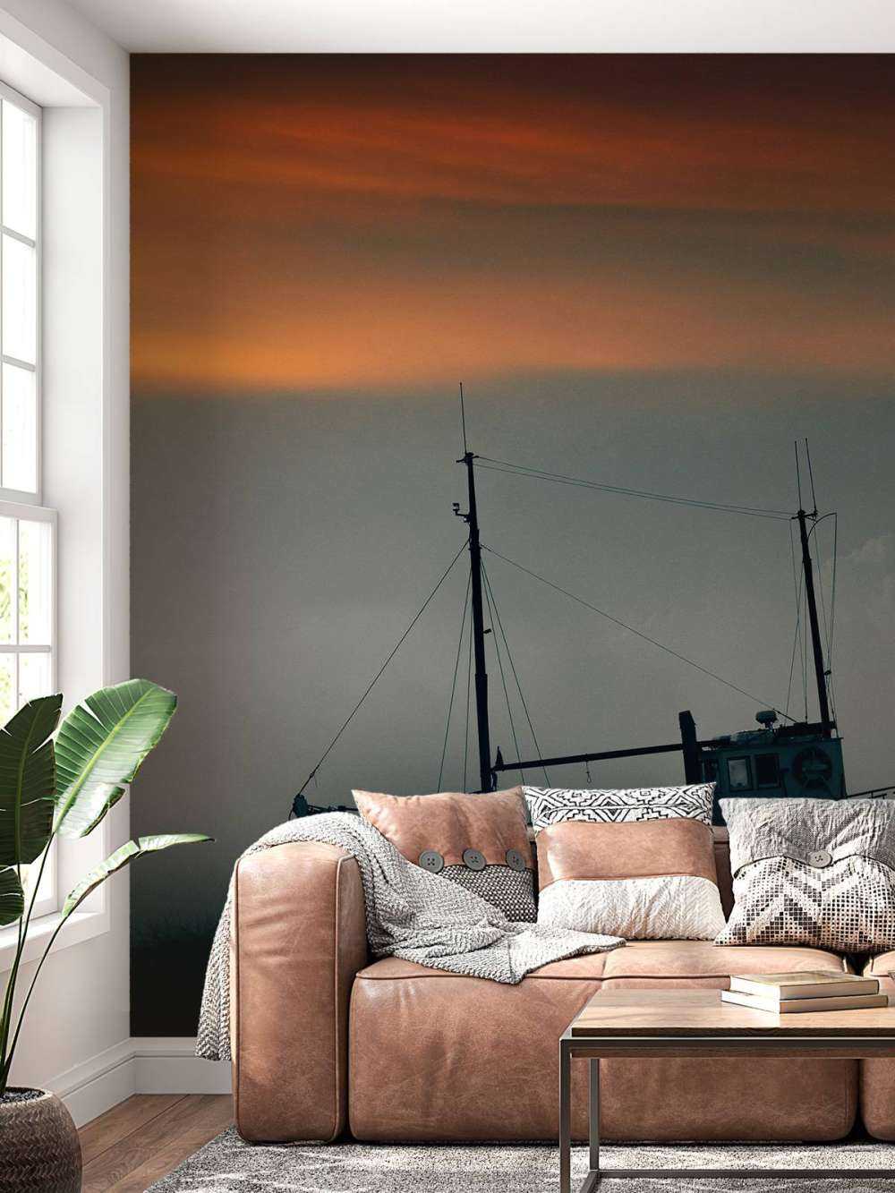 Boot tijdens de zonsondergang