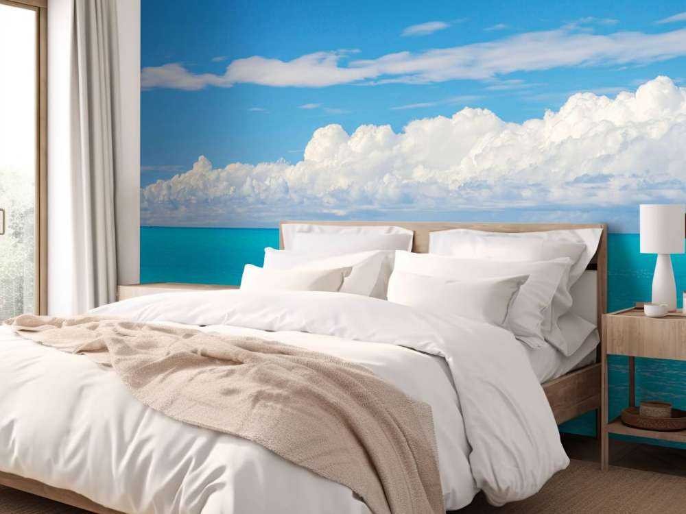 Panoramic view of a blue seascape with sailboat and cloudy sky