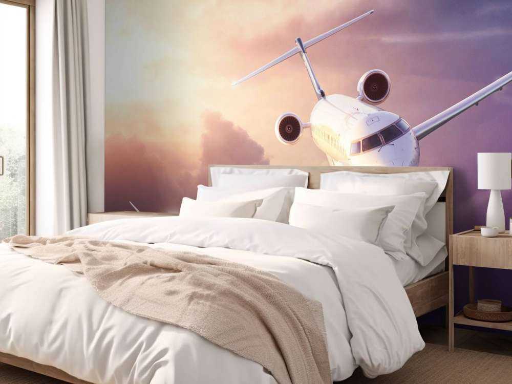 Witte vliegtuig bij zonsondergang