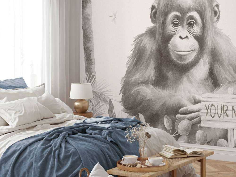 Jonge orang-oetan in de jungle beige