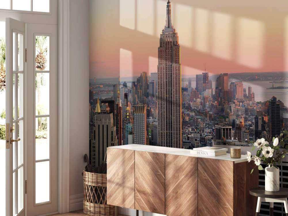 De Skyline van New York bij zonsondergang