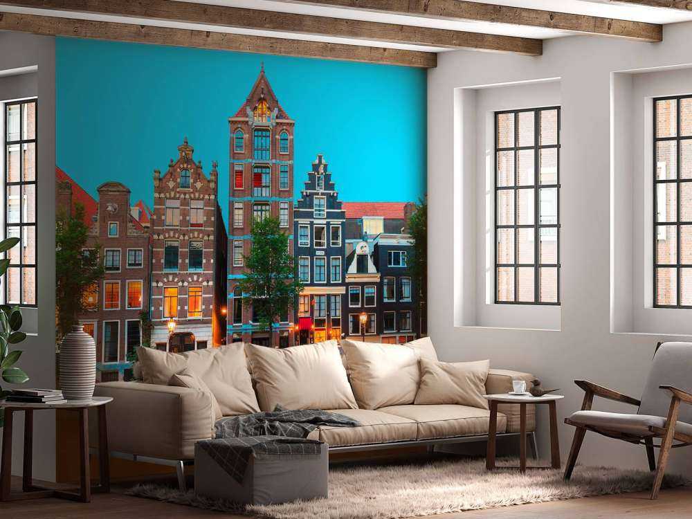 Amsterdamse grachtenpanden in de avond