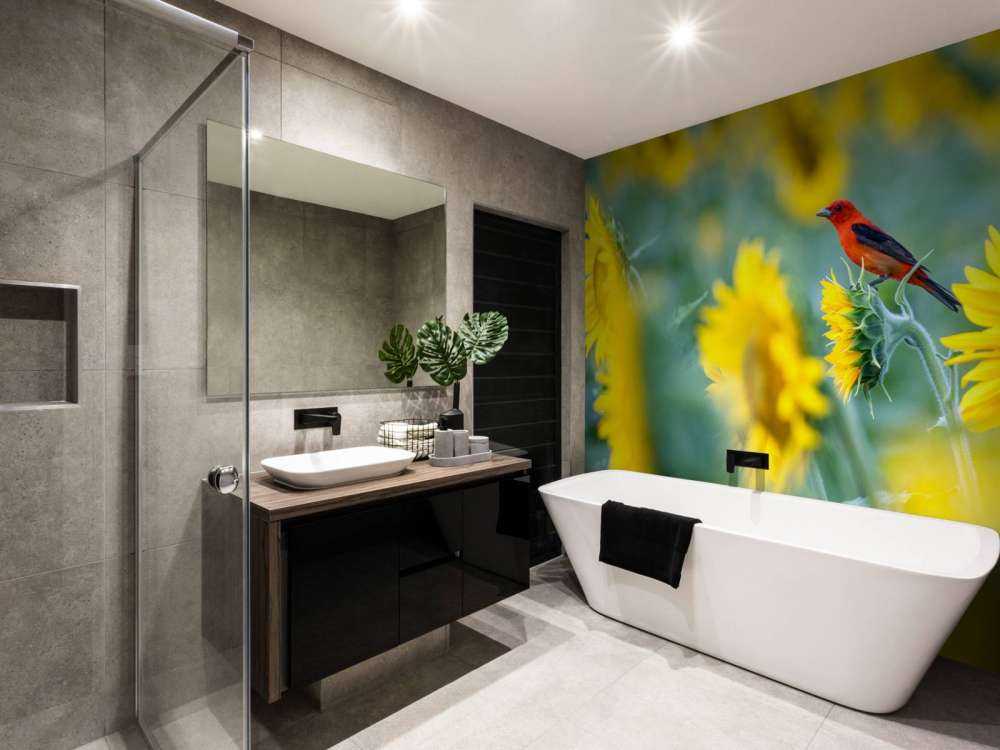 Zonnebloemenveld met rood vogeltje