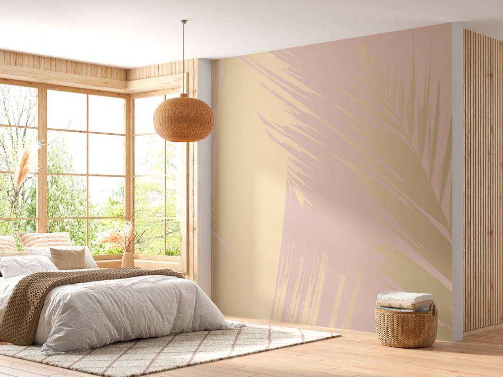 Gouden palmbladeren met een roze achtergrond