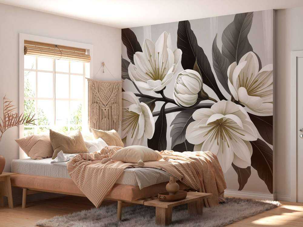 Witte magnoliabloemen met donkere bladeren
