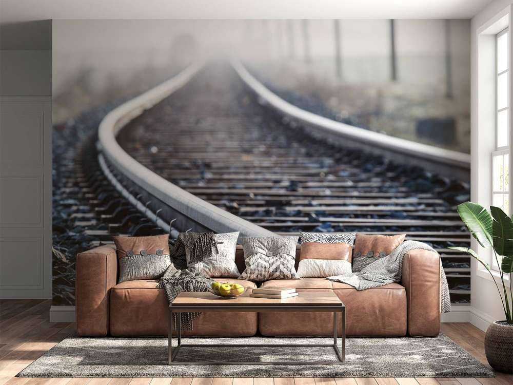 Treinspoor in de ochtendnevel