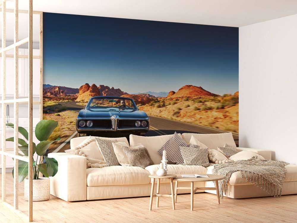 Muscle car in een Amerikaans landschap