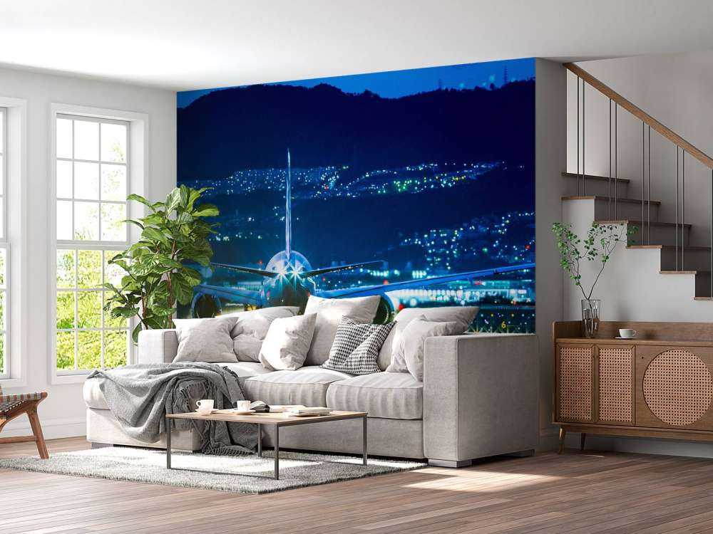 Vliegtuig op een verlicht vliegveld