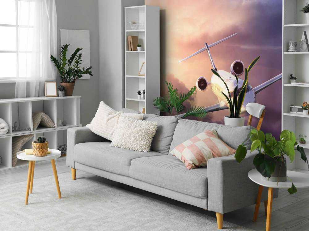 Witte vliegtuig bij zonsondergang