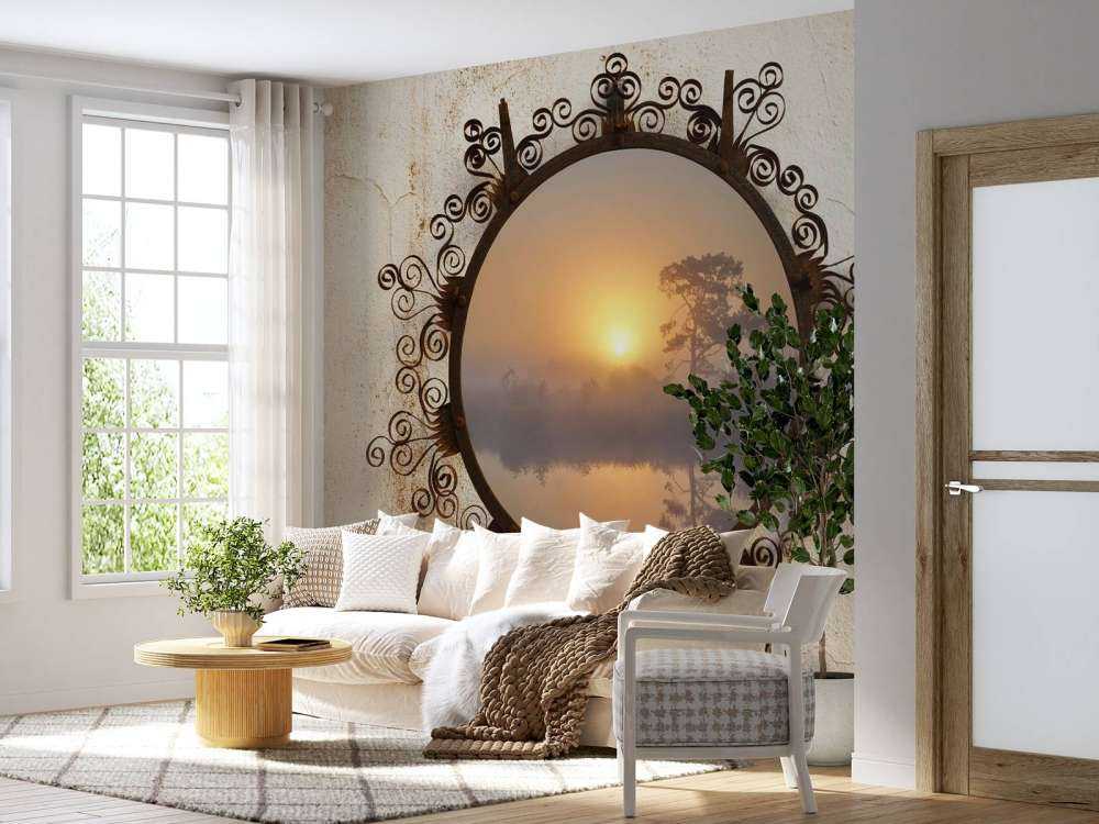 Zonsopkomst boven mistig meer