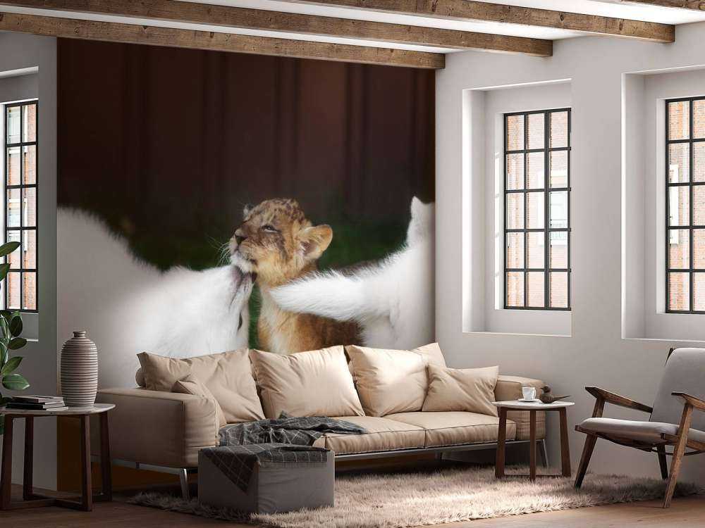 Welpje speelt met Zwitserse witte herders