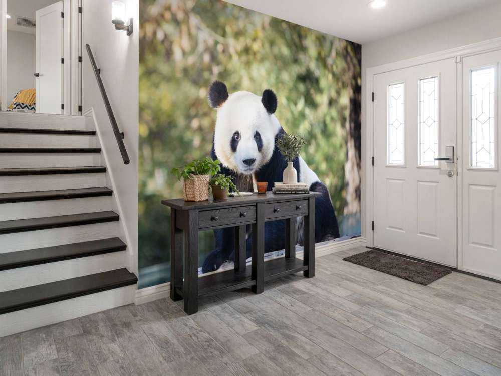 Panda op een houten balk