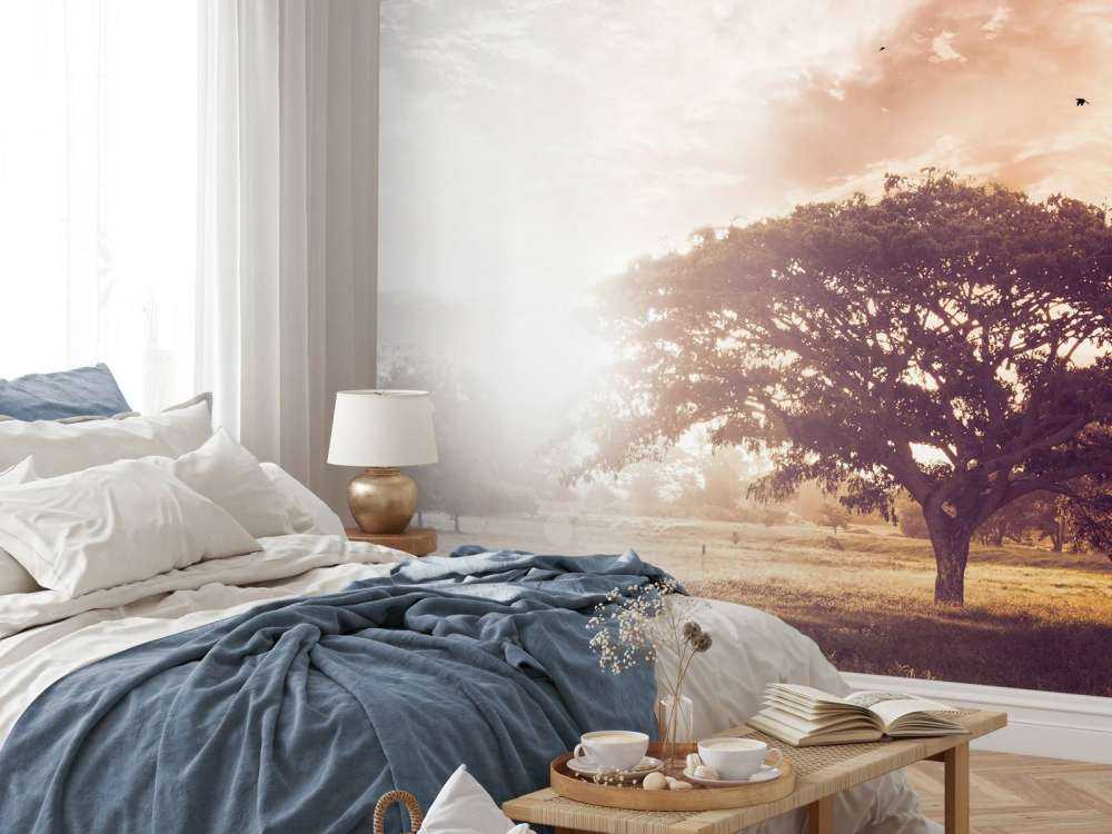 Bewerkte foto van een boom bij zonsondergang