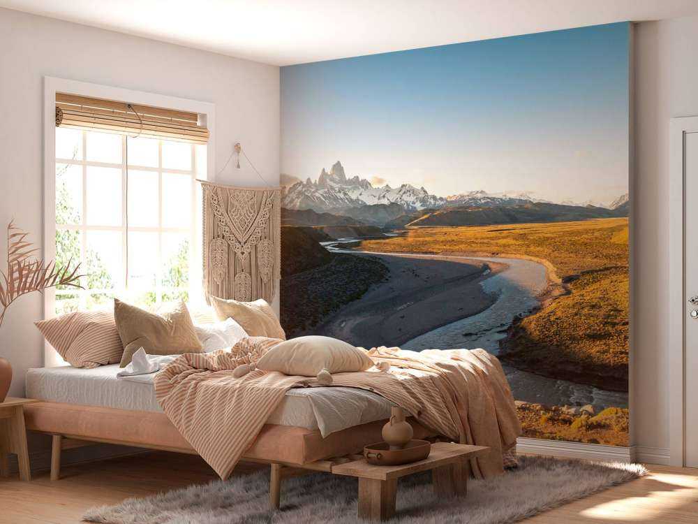 Berglandschap met kronkelende rivier in ochtendlicht