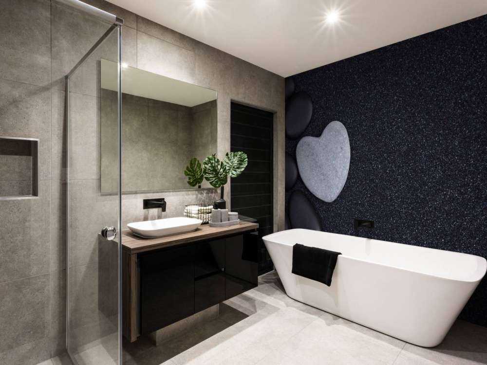 Zwarte stenen met grijze hartvormige steen