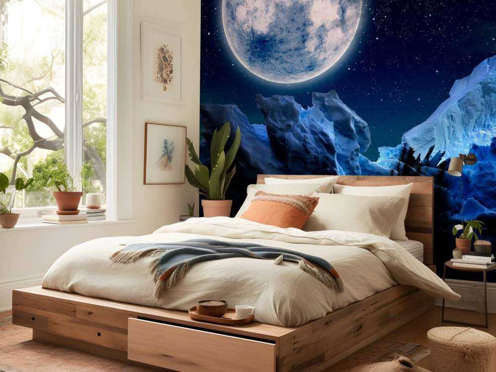 Volle maan boven ijsbergen