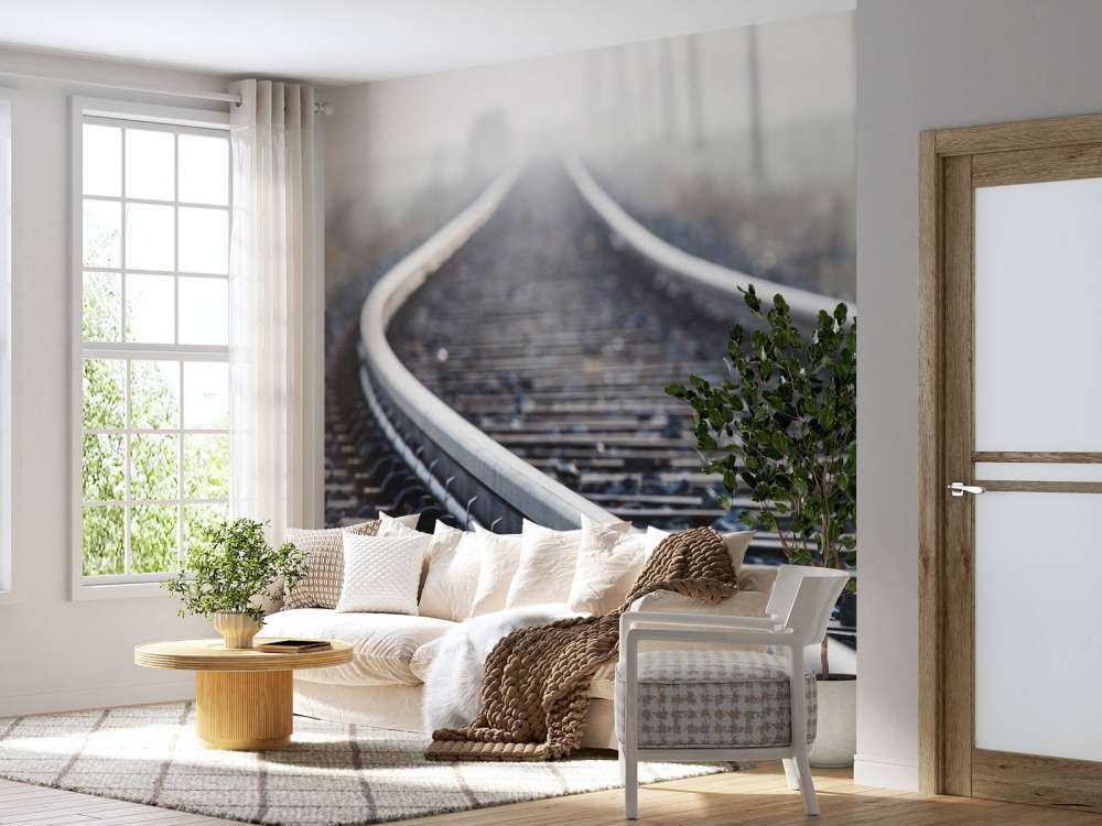 Treinspoor in de ochtendnevel