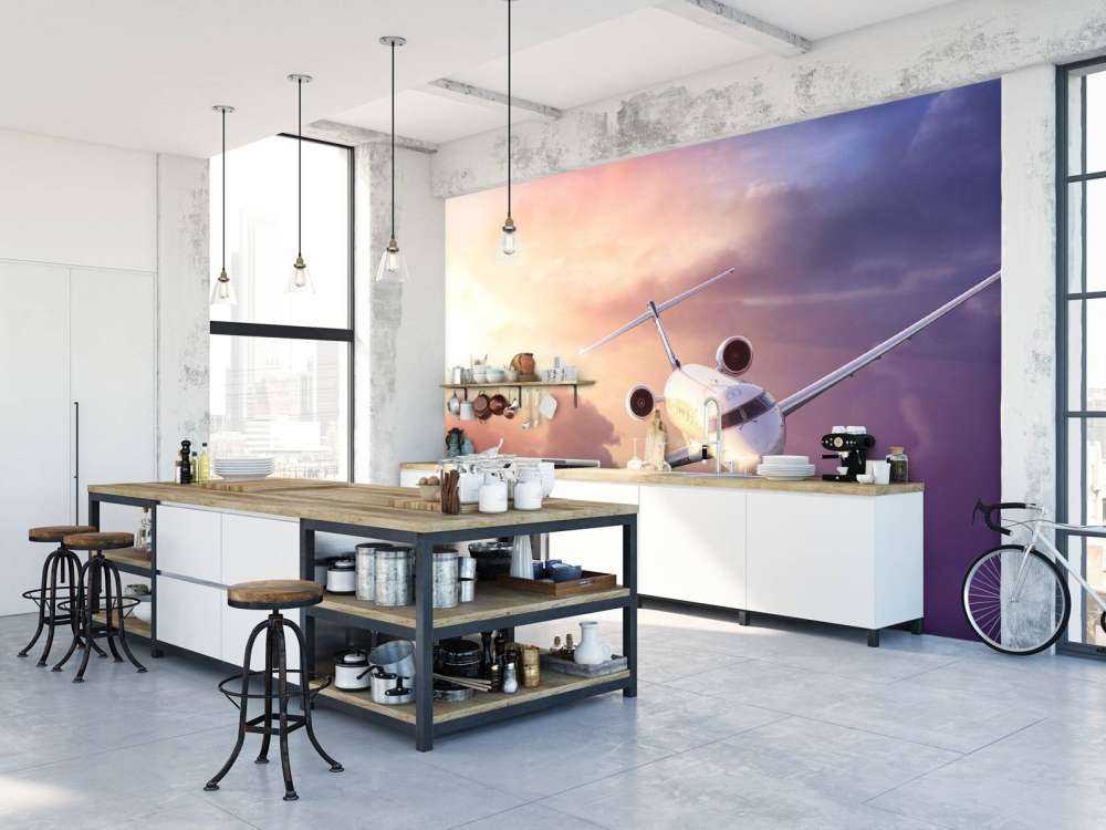 Witte vliegtuig bij zonsondergang