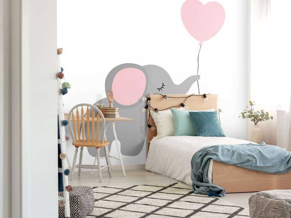 Olifant met een hartvormige ballon