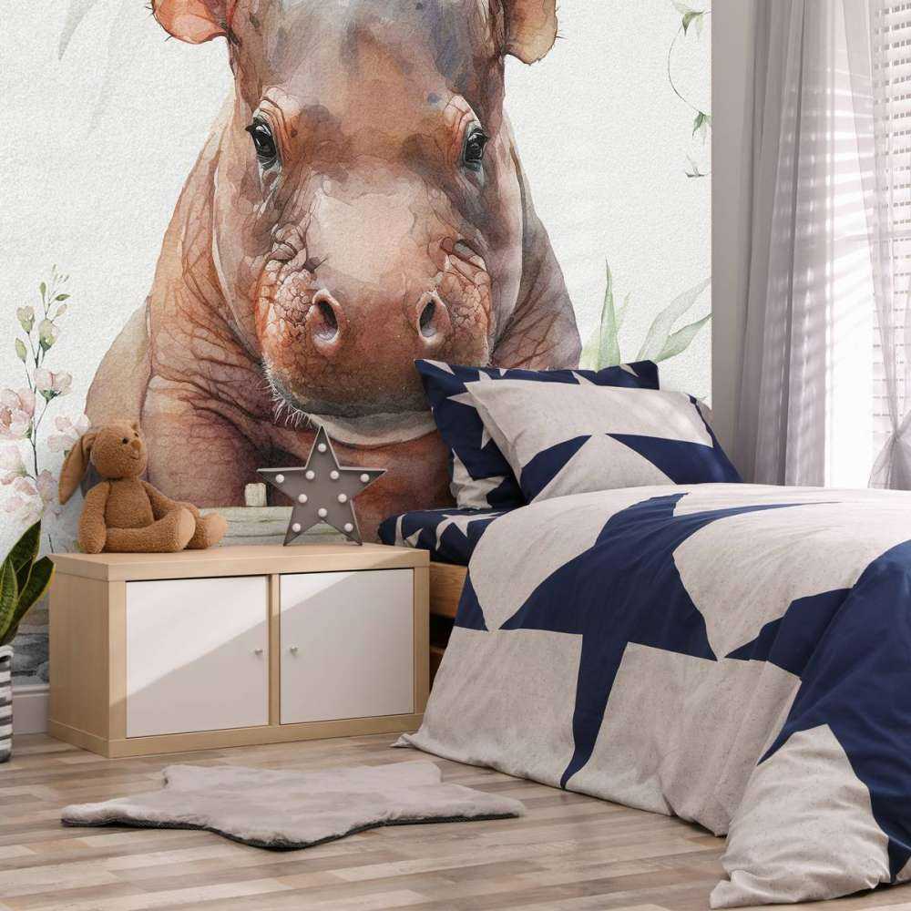 Baby nijlpaard in de bladeren