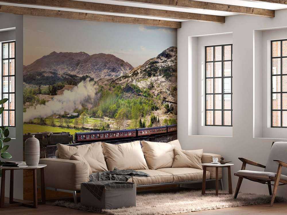 Stoomtrein door een prachtig landschap in Schotland