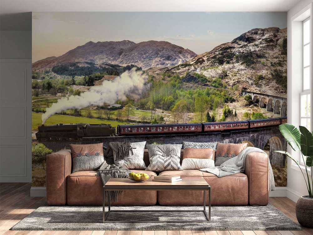 Stoomtrein door een prachtig landschap in Schotland