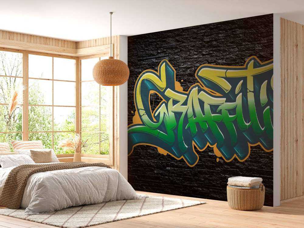 Graffiti op muur van zwarte stenen