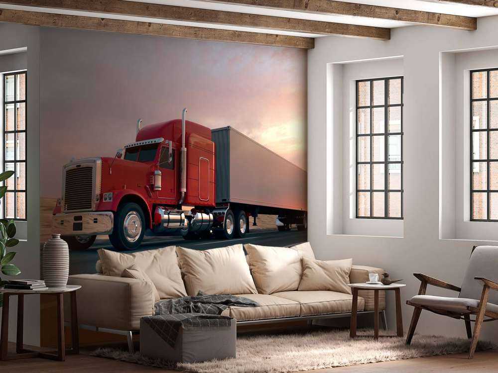 Rode Amerikaanse vrachtwagen bij zonsondergang