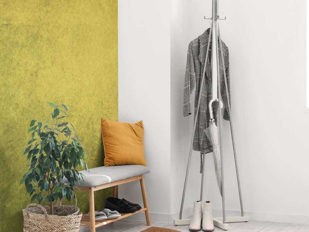 Oude geel-groene muur