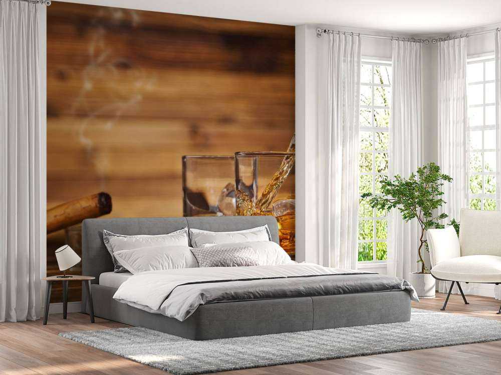 Glazen whiskey met sigaren